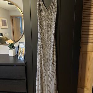 Elegant Silver Beaded Gown by Adrianna Pappell